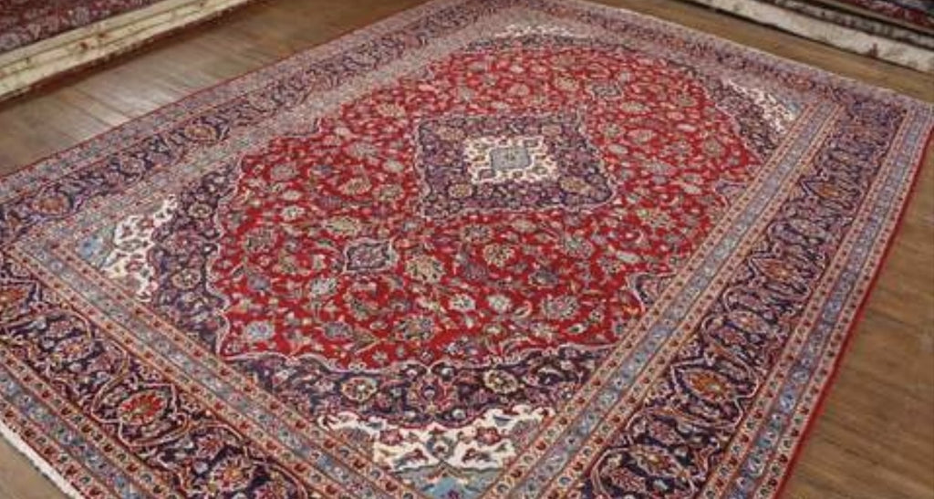 Decorative rug with intricate patterns on a wooden floor